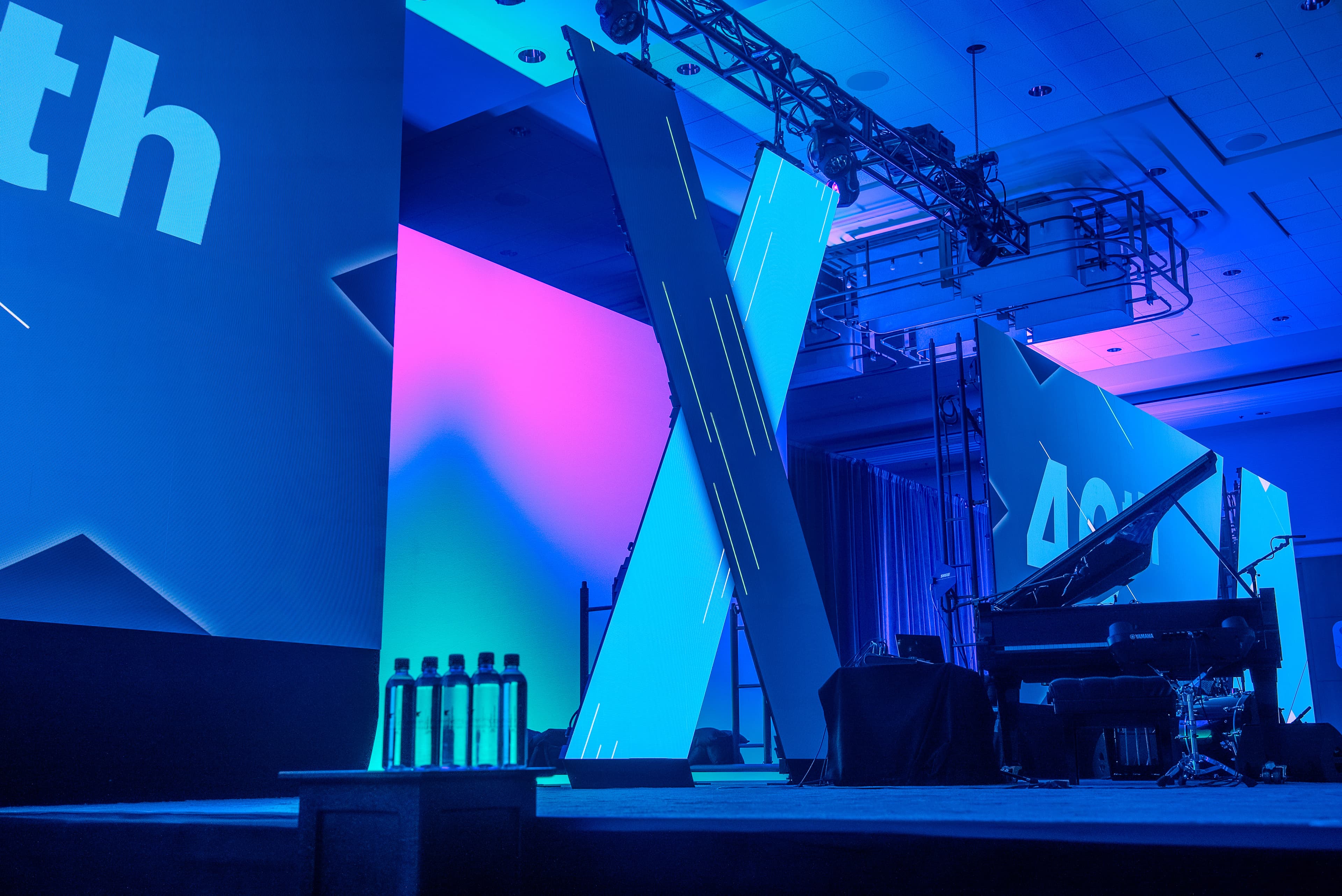 Large-format ROE Visual LED wall installed on stage at a corporate general session