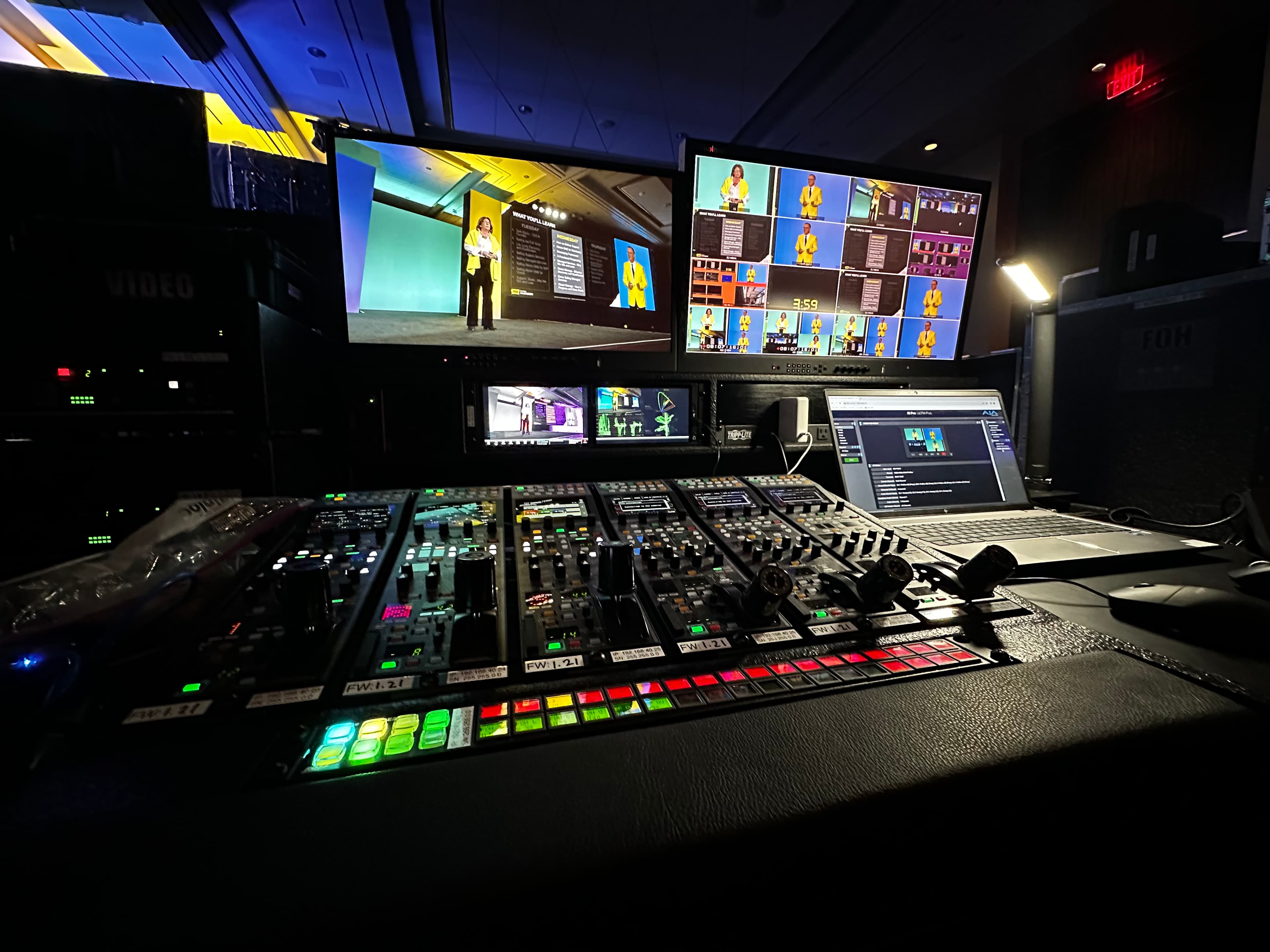 FOH Productions video engineer operating a live switching console during a corporate event